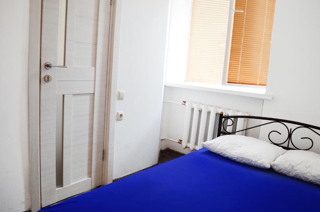 Postel nebo postele na pokoji v ubytování Hostel Vokzal