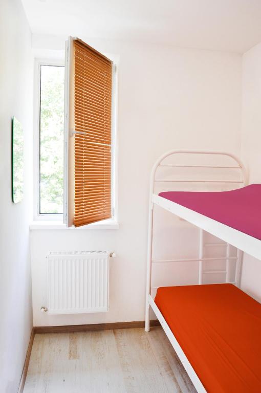 Postel nebo postele na pokoji v ubytování Hostel Vokzal