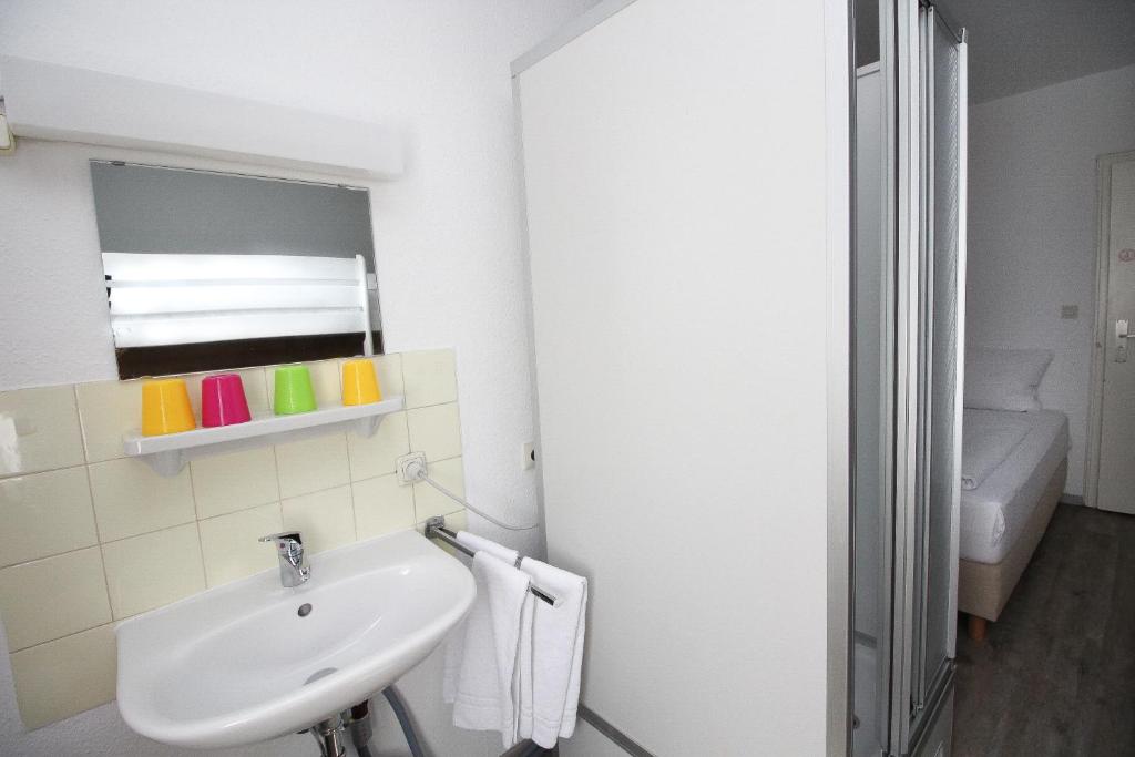 Koupelna v ubytování Hotel Pension Köberl