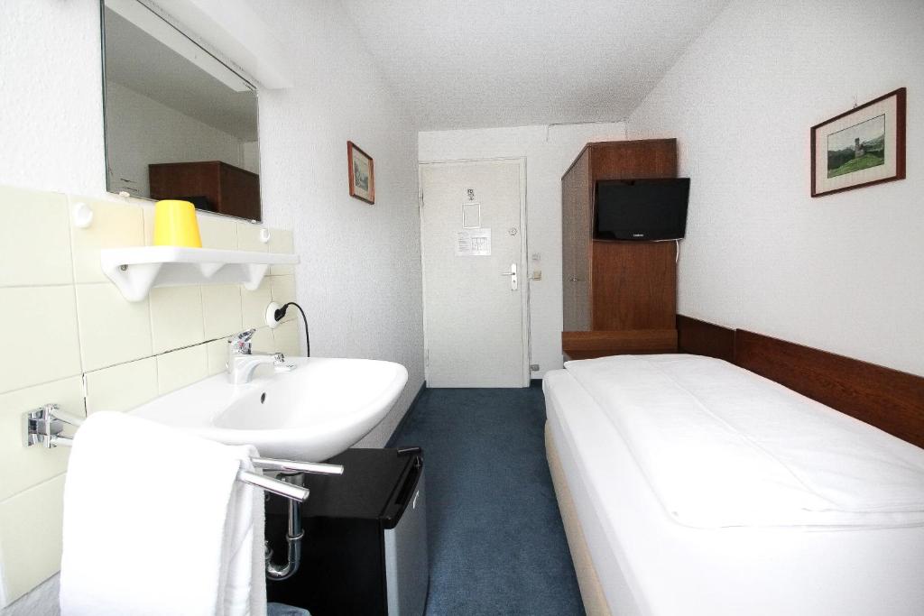 Postel nebo postele na pokoji v ubytování Hotel Pension Köberl
