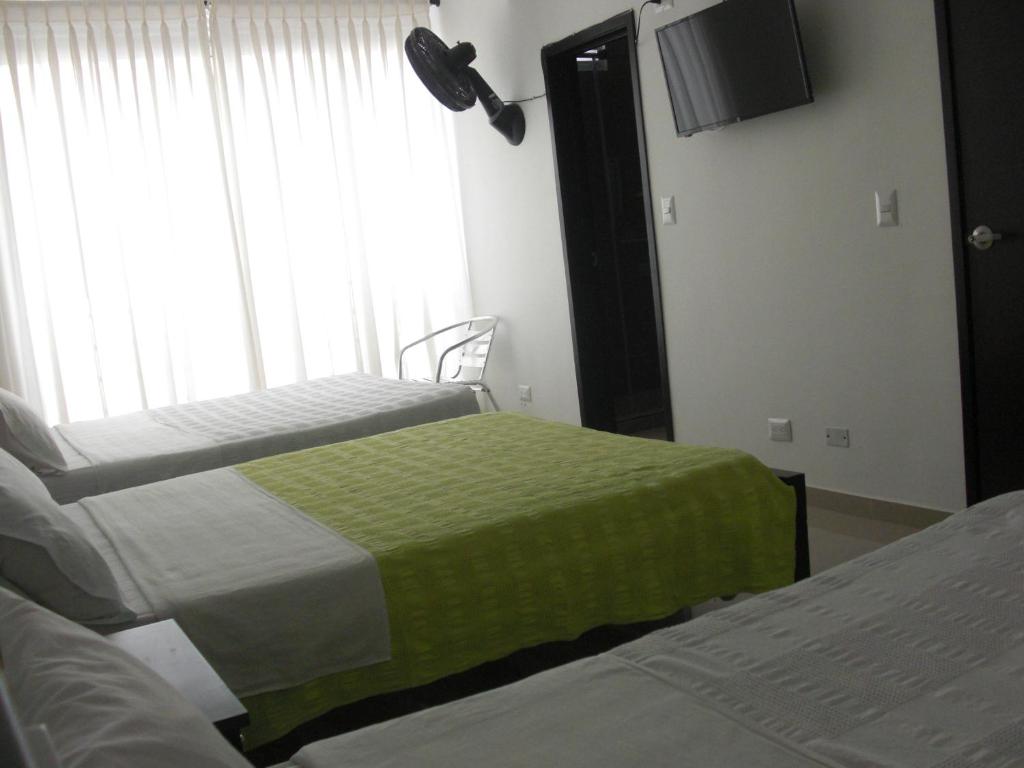 Voodi või voodid majutusasutuse Hotel Aussie koala toas
