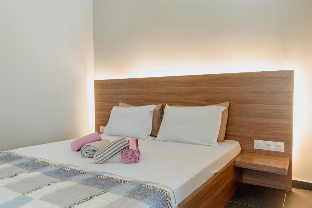 A bed or beds in a room at Stylish Suites, The Luxury Suites