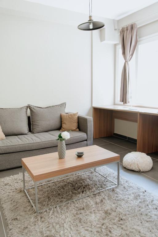 A seating area at Stylish Suites, The Luxury Suites