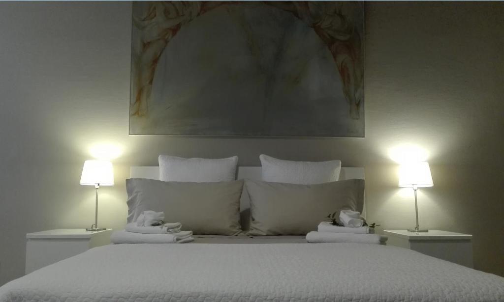 A bed or beds in a room at Studio in Casa Cogollo