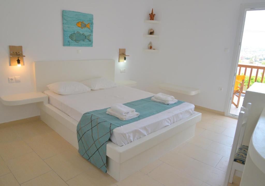 Postel nebo postele na pokoji v ubytování Corali Hotel
