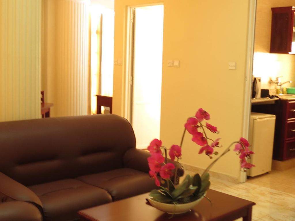 Kuchyň nebo kuchyňský kout v ubytování Al Ferdous Hotel Apartments