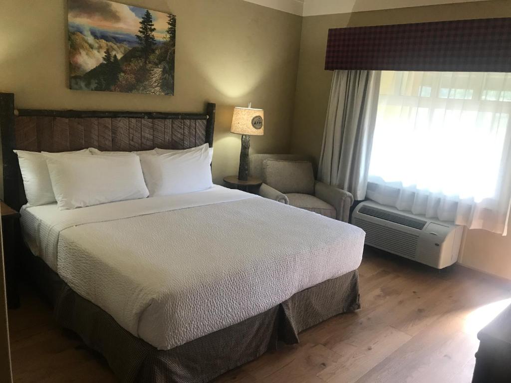 Ein Bett oder Betten in einem Zimmer der Unterkunft The Appy Lodge