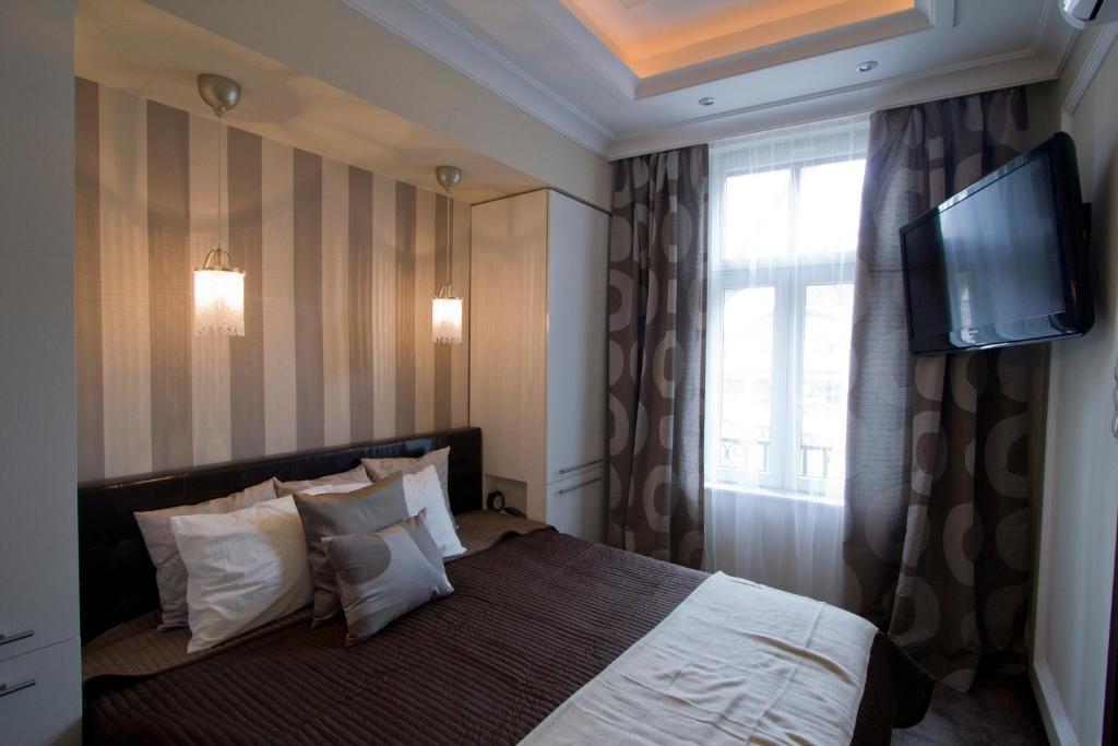 Posteľ alebo postele v izbe v ubytovaní Elisabeth Bridge Apartmans