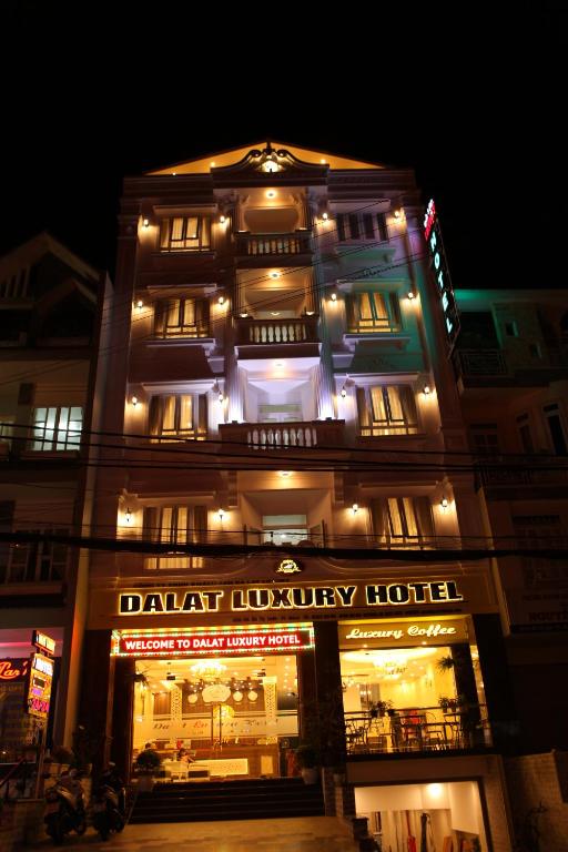 aldart luxury hotel at night with lights at Dalat Luxury Hotel in Da Lat