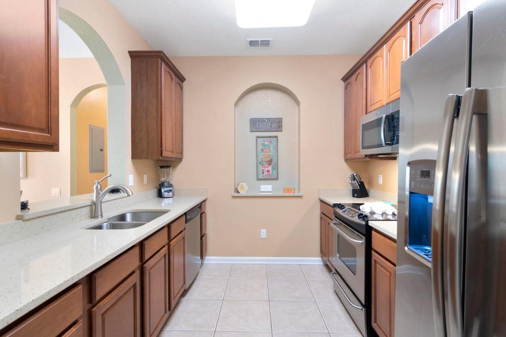 Kuchyň nebo kuchyňský kout v ubytování Orlando Resort Rentals at Universal Boulevard