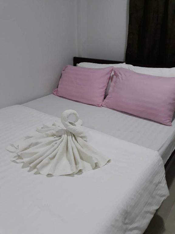 Postel nebo postele na pokoji v ubytování D Heart Homestay