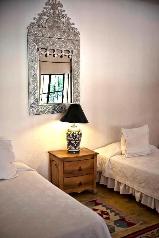 Postel nebo postele na pokoji v ubytování Casa Marly