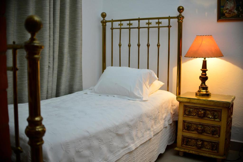 Postel nebo postele na pokoji v ubytování Casa Marly