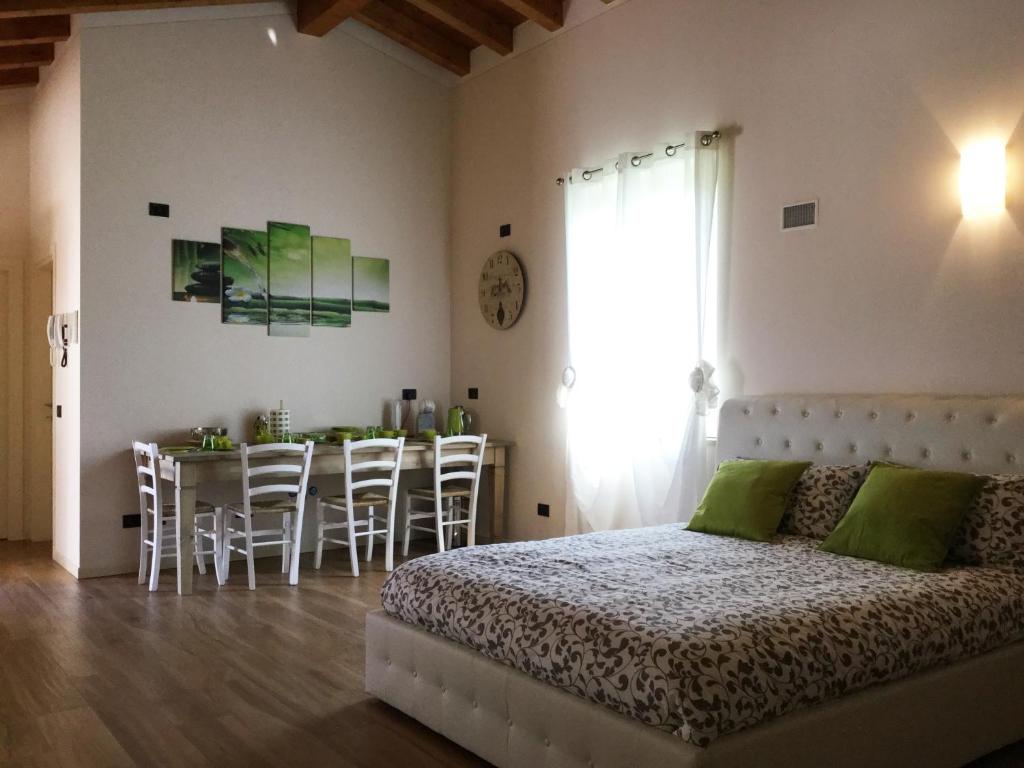 Postel nebo postele na pokoji v ubytování B&B CORTE SANT'ANGELO