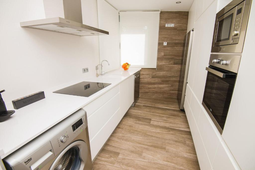 A kitchen or kitchenette at Villa Can Nieves