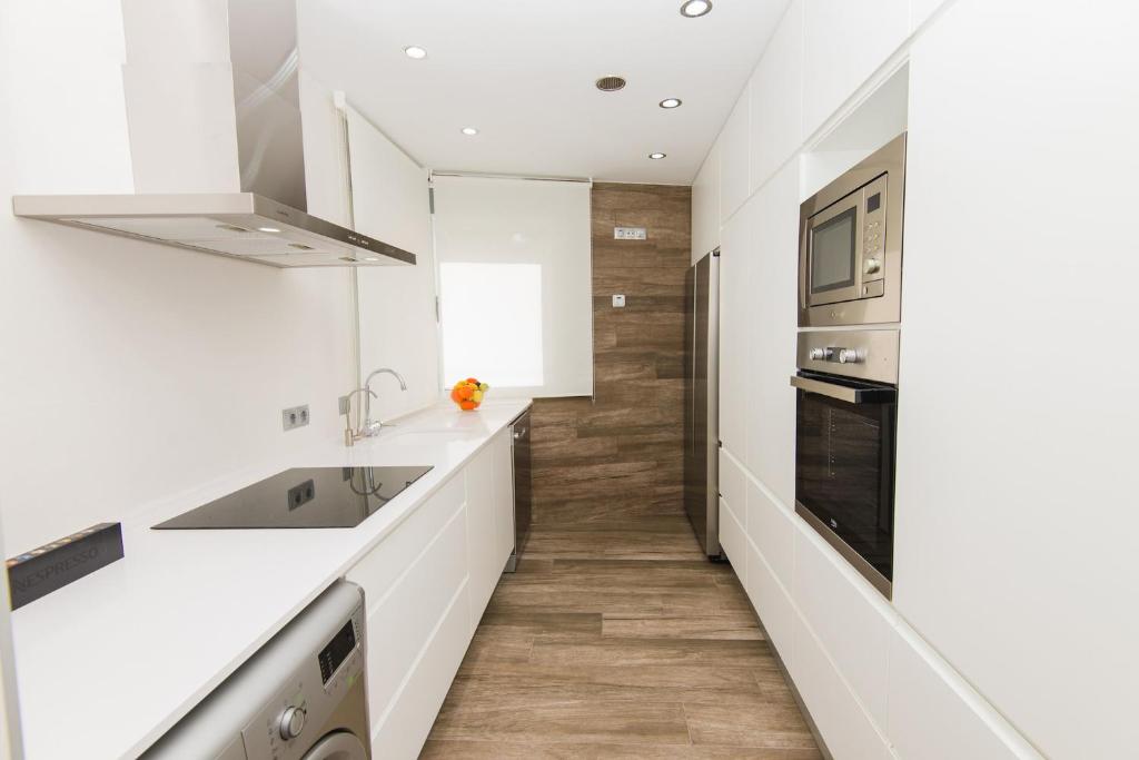 A kitchen or kitchenette at Villa Can Nieves