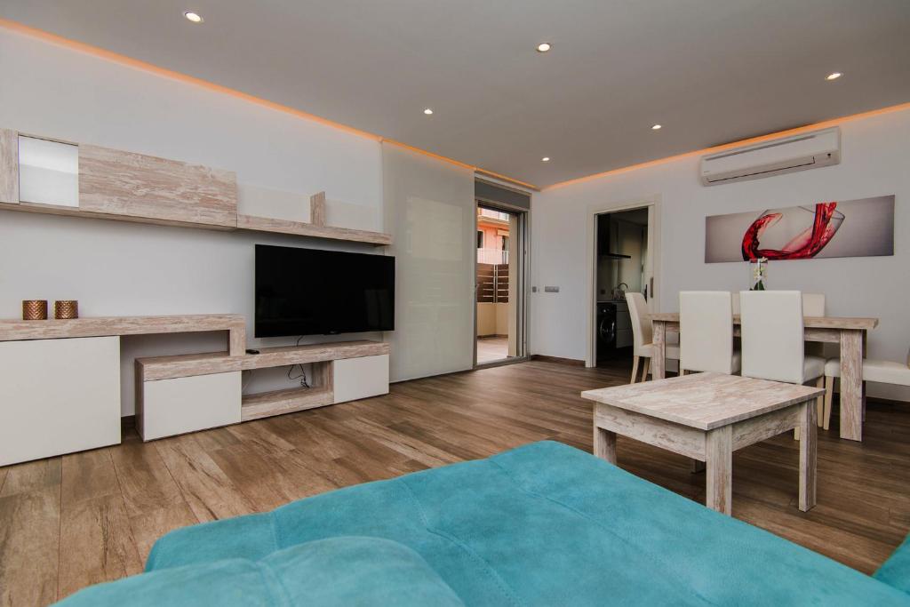 A television and/or entertainment centre at Villa Can Nieves