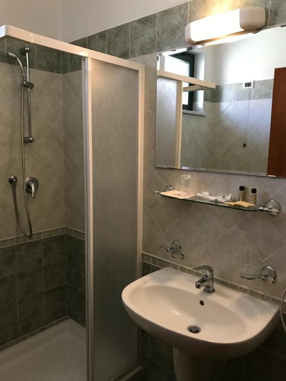 Koupelna v ubytování Hotel Rigolfo