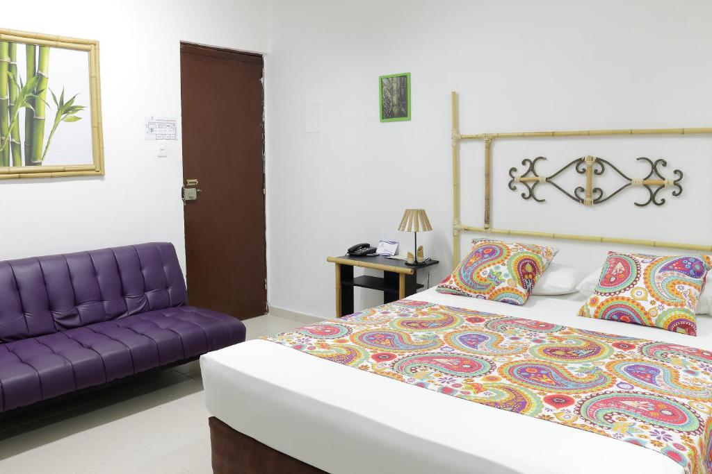 Postel nebo postele na pokoji v ubytování Hotel Zandu