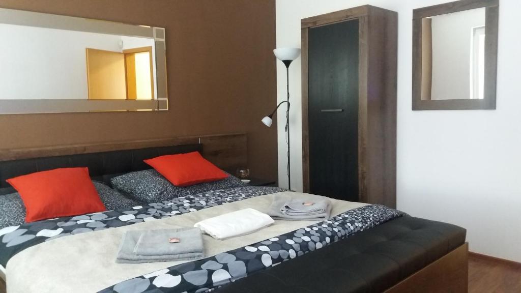 Postel nebo postele na pokoji v ubytování Metropole De Luxe Suite