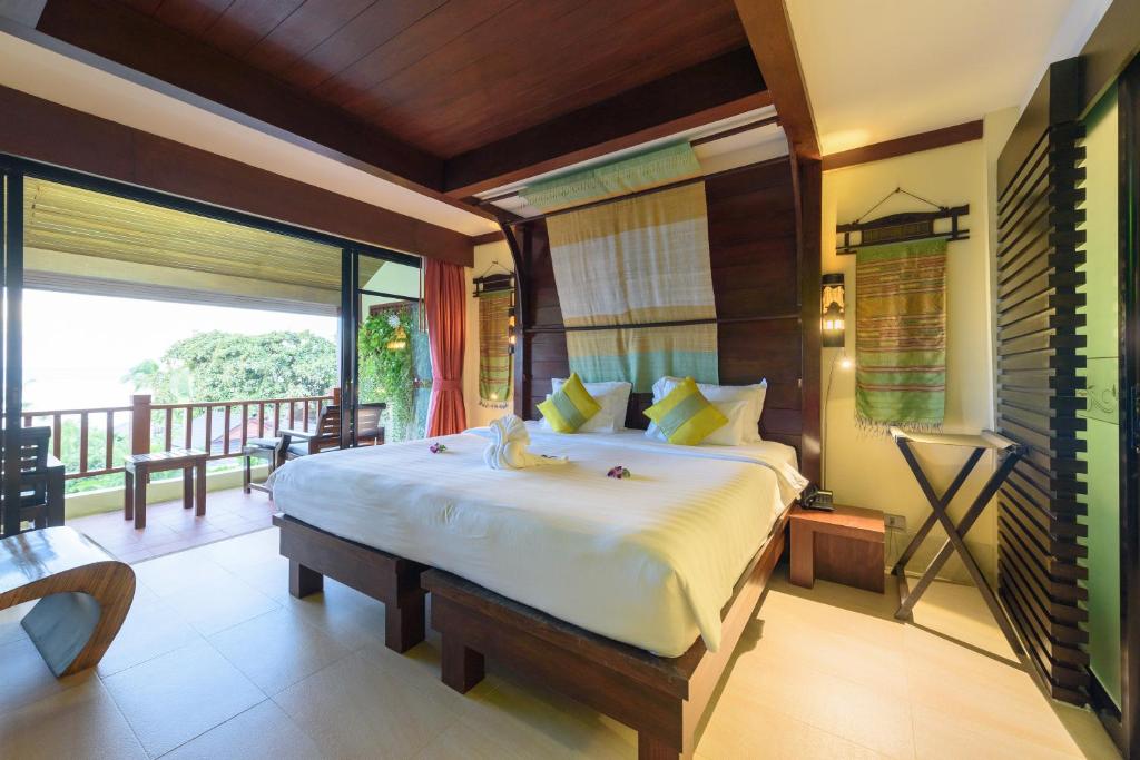 Postel nebo postele na pokoji v ubytování Samui Jasmine Resort - SHA Plus