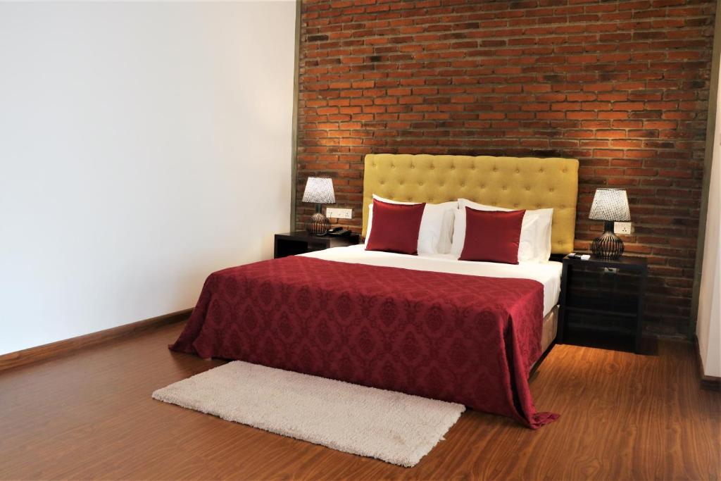 Postel nebo postele na pokoji v ubytování Daffodils Beach Negombo