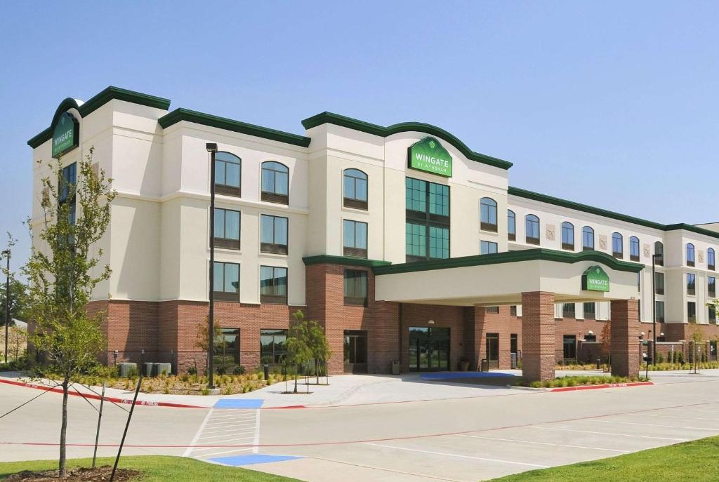 a rendering of a hospital building at Wingate By Wyndham Frisco in Frisco