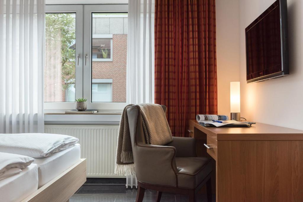 TV a/nebo společenská místnost v ubytování Hotel Europa
