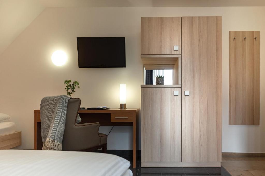 Postel nebo postele na pokoji v ubytování Hotel Europa