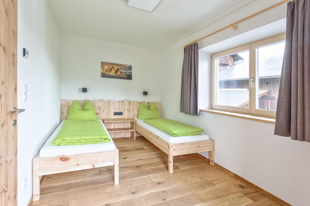 Postel nebo postele na pokoji v ubytování Frühaufhof