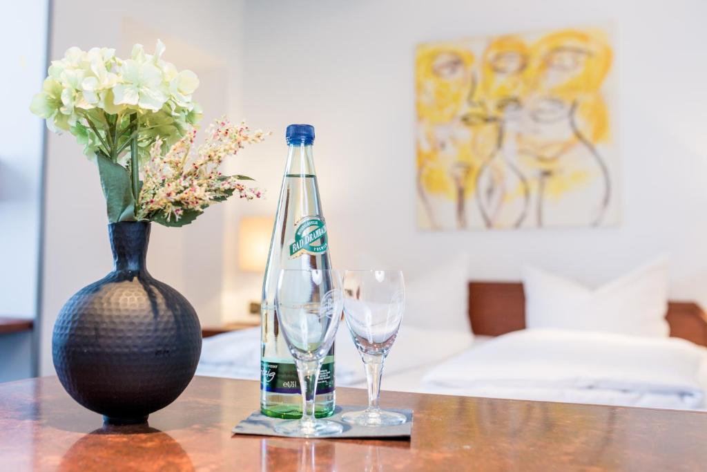 Postel nebo postele na pokoji v ubytování Arotel Best living Nürnberg