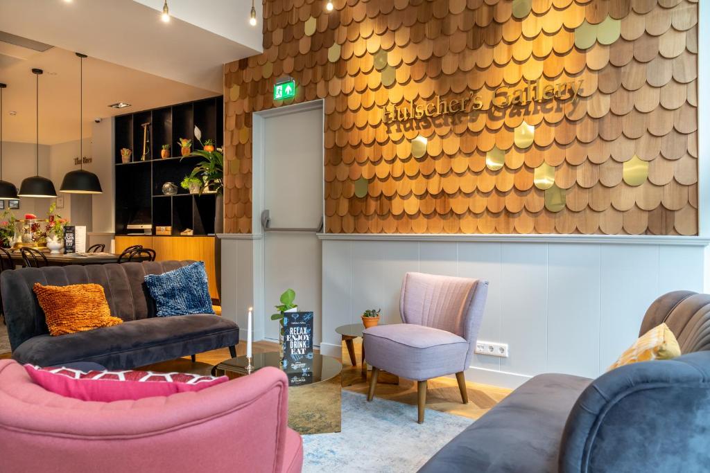 Een zitgedeelte bij Hotel Die Port van Cleve