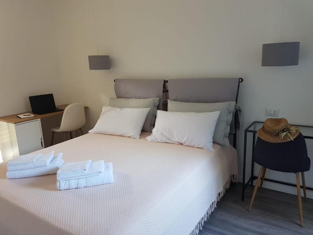 Postel nebo postele na pokoji v ubytování Varenna Sweet Home