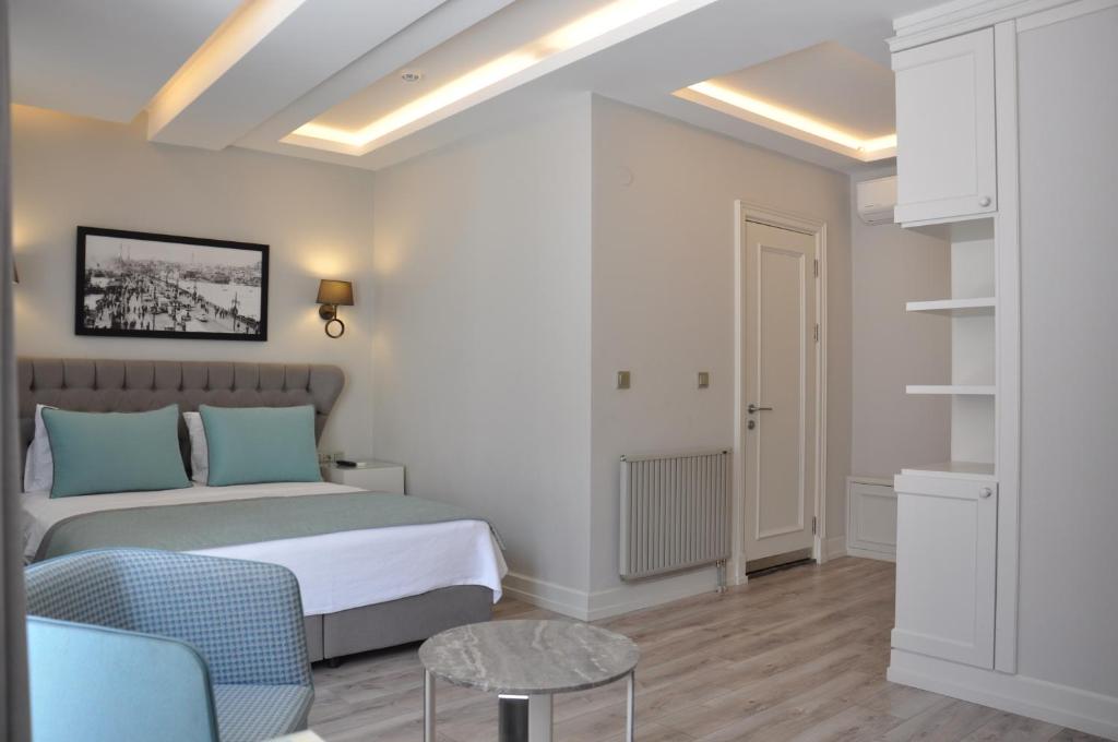 Postel nebo postele na pokoji v ubytování Centrum Suites İstanbul