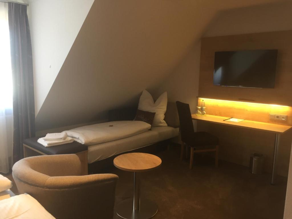TV a/nebo společenská místnost v ubytování Gästehaus - Kretschmannshof