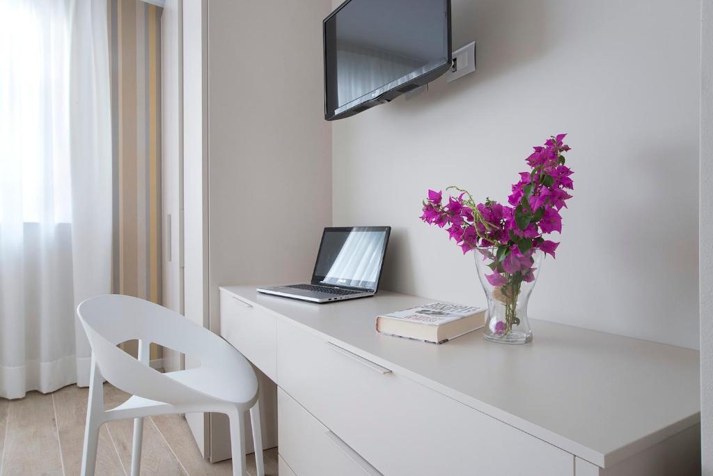 TV a/nebo společenská místnost v ubytování Residence Dolcemare