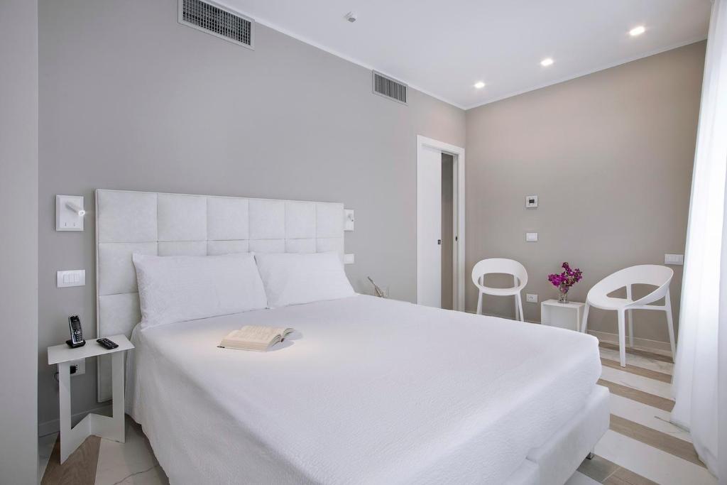 Postel nebo postele na pokoji v ubytování Residence Dolcemare