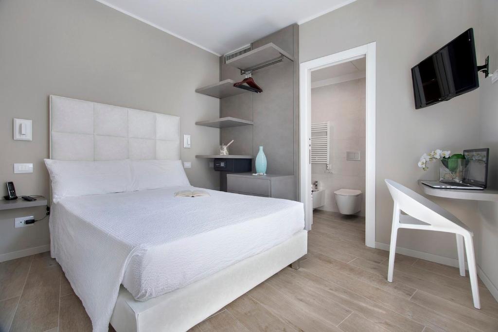 Postel nebo postele na pokoji v ubytování Residence Dolcemare