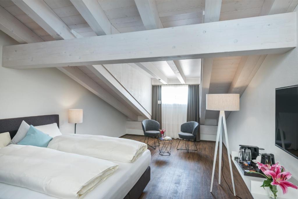 Postel nebo postele na pokoji v ubytování Hotel Mischun