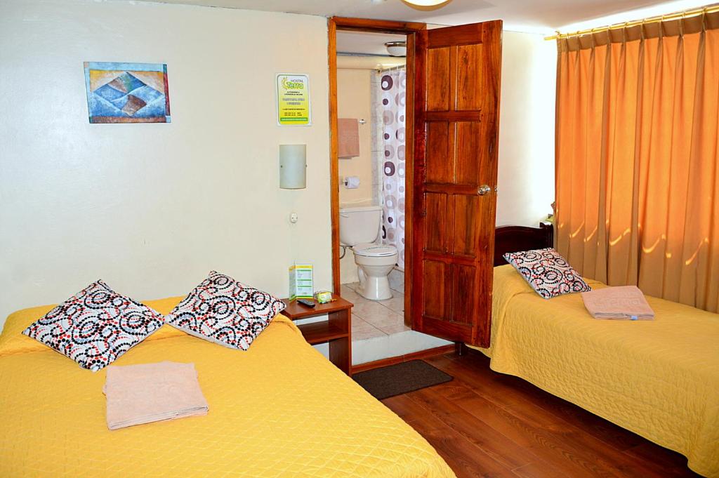 Postel nebo postele na pokoji v ubytování Hostal Terra 4 - EL LABRADOR