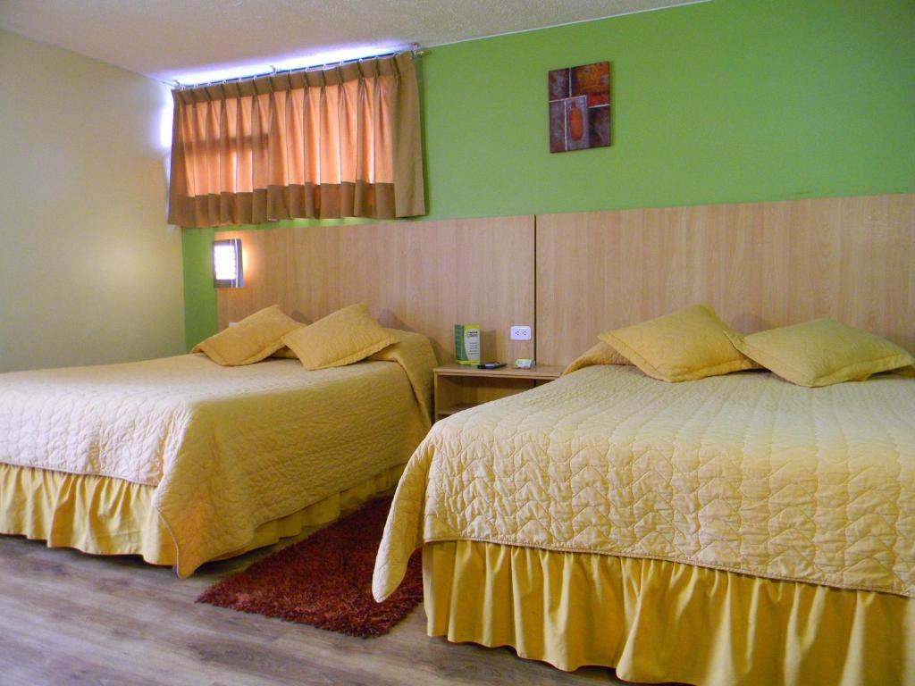 Postel nebo postele na pokoji v ubytování Hostal Terra 4 - EL LABRADOR