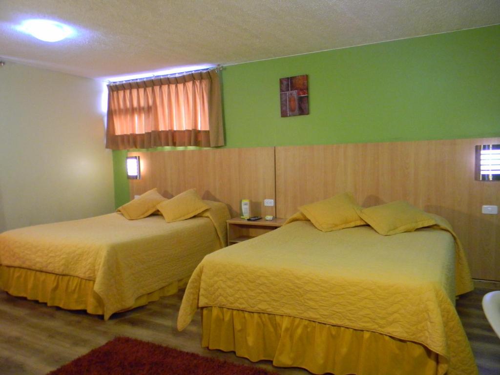 Postel nebo postele na pokoji v ubytování Hostal Terra 4 - EL LABRADOR