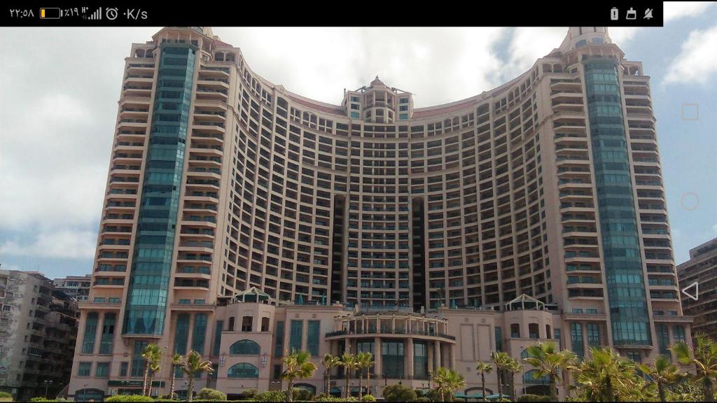 a large building with a lot of windows at أجنحة ابراج سان استفانو in Alexandria