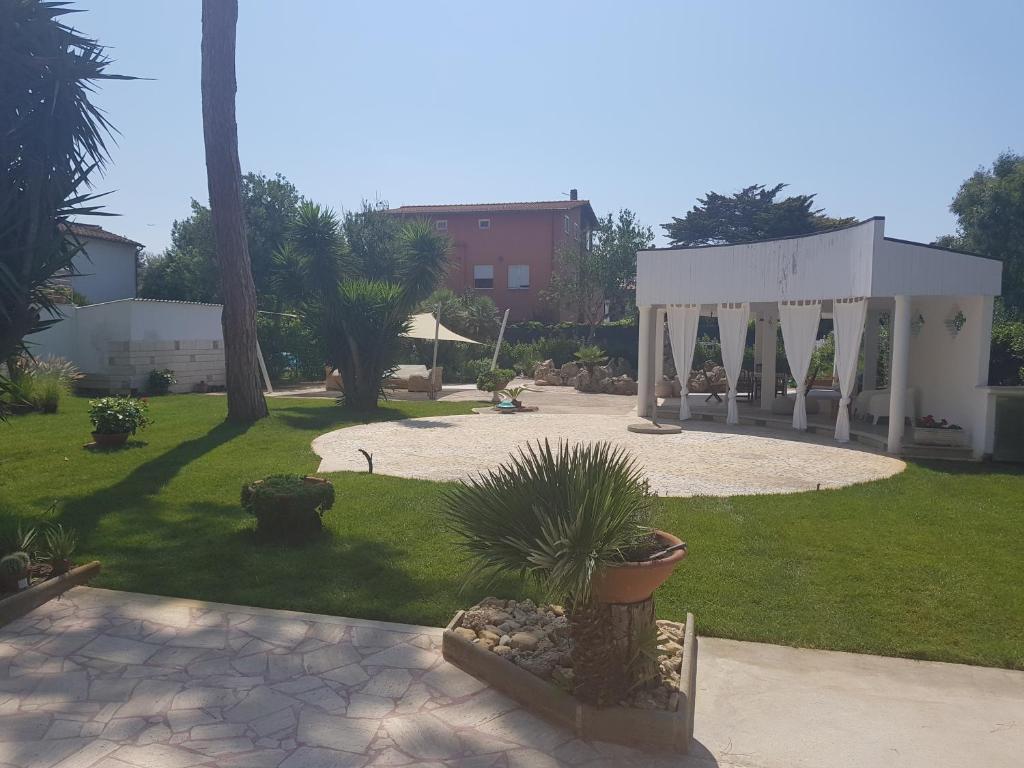 Zahrada ubytování Golden Beach Residence