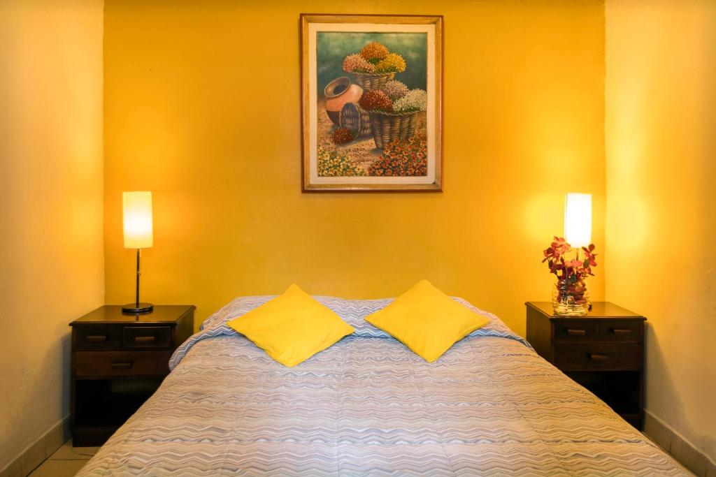 Letto o letti in una camera di Flying Dog Hostel