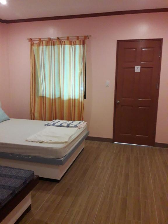 Postel nebo postele na pokoji v ubytování cubby's guesthouse