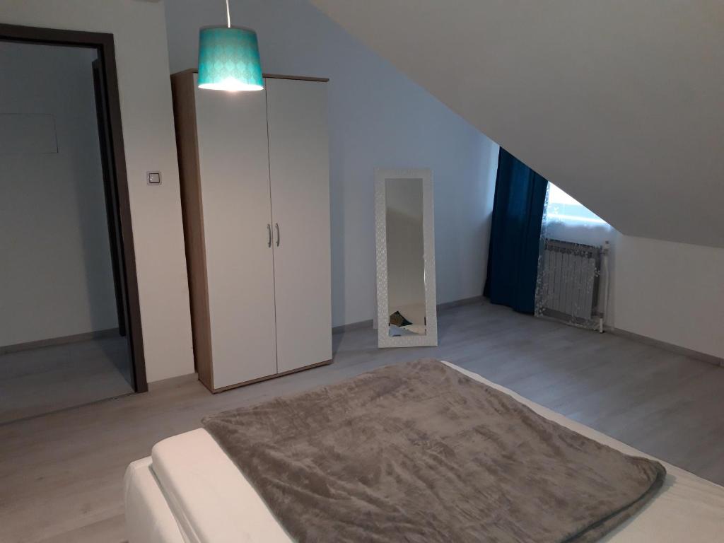Posteľ alebo postele v izbe v ubytovaní Apartman Mohenski