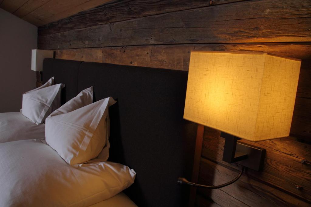 Postel nebo postele na pokoji v ubytování Hotel Kirchenwirt