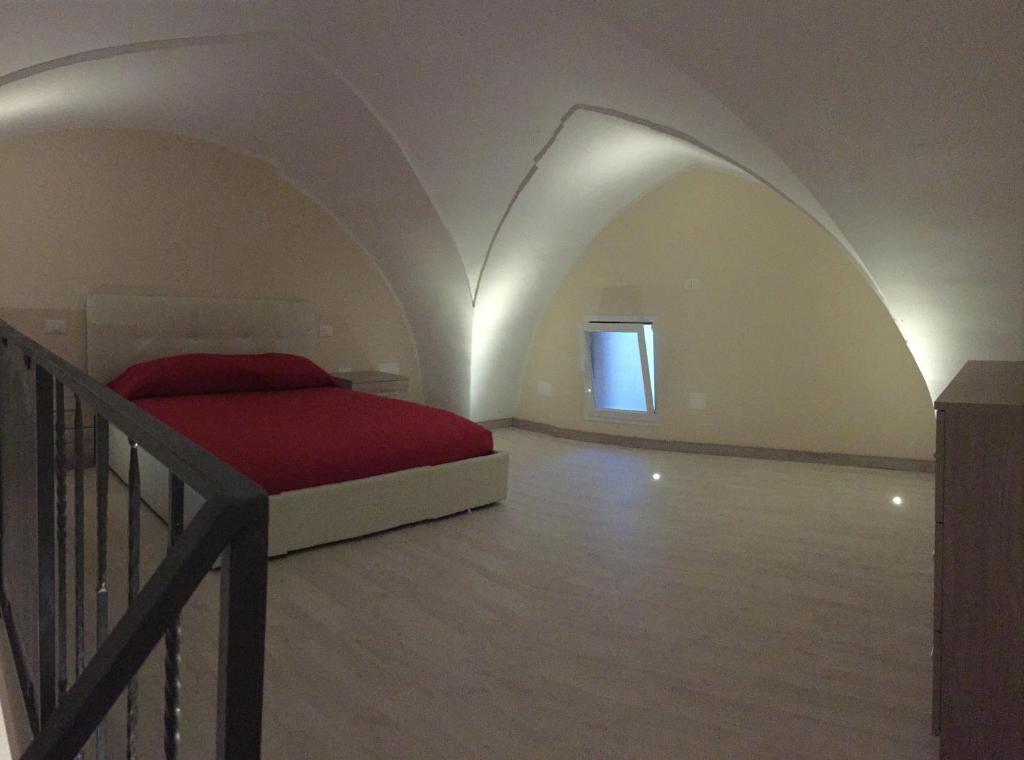 Łóżko lub łóżka w pokoju w obiekcie B&B MARIO PAGANO