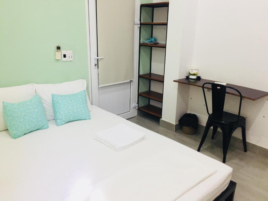 Un ou plusieurs lits dans un hébergement de l'établissement Dolphin Home